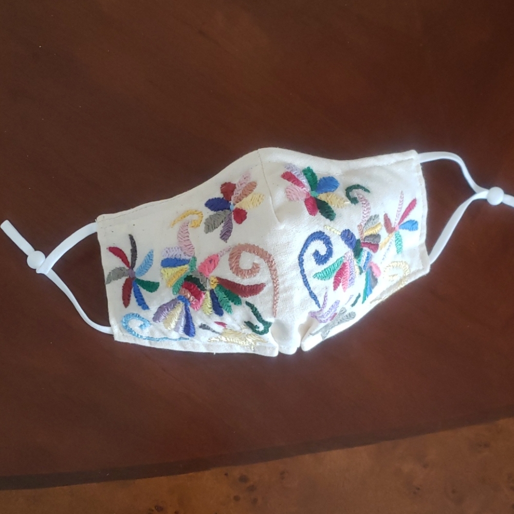 Handmade embroidery face mask.